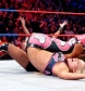 19-_Michelle_attacks_Natalya_while_the_referee_is_distracted_.jpg