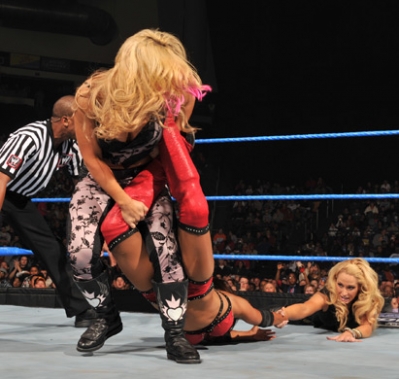 9-_Michelle_McCool_tries_to_help.jpg