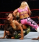 11-_Natalya_locks_both_Eve_and_Layla_into_the_Sharpshooter21.jpg