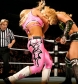 2-_Natalya_locks_up_with_Michelle_McCool_in_this_explosive_Divas_tag_bout_.jpg